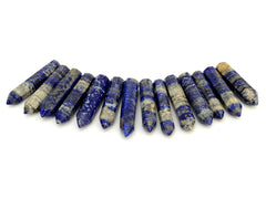 Some faceted lapis lazuli points 50mm-55mm on white background
