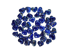 Several blue lapis lazuli heart crystals 25mm.35mm on white background