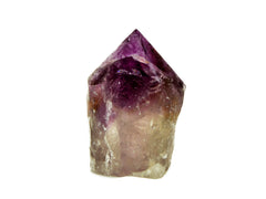 One large amethyst semi polished point 90mm on white background