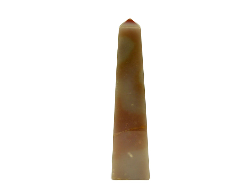Reverse of large pink banded onyx crystal obelisk 250mm on white background