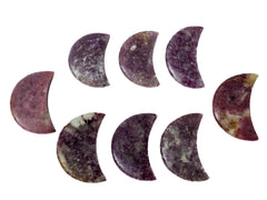 Some purple lepidolite moon carved crystals 85mm-90mm on white background