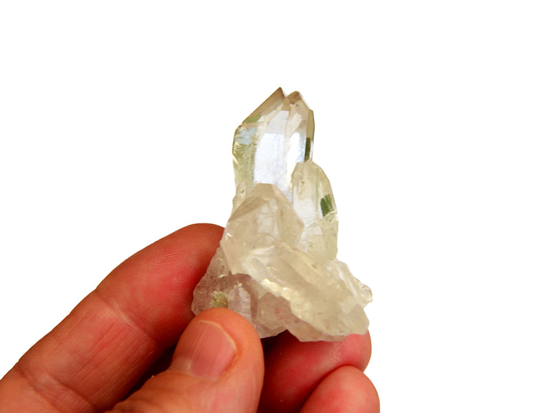 One mini rock crystal cluster 30mm on hand with white background
