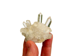 One mini clear quartz druzy 40mm on hand with white background