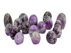 Several amethyst quartz free forms 55mm-100mm on white background