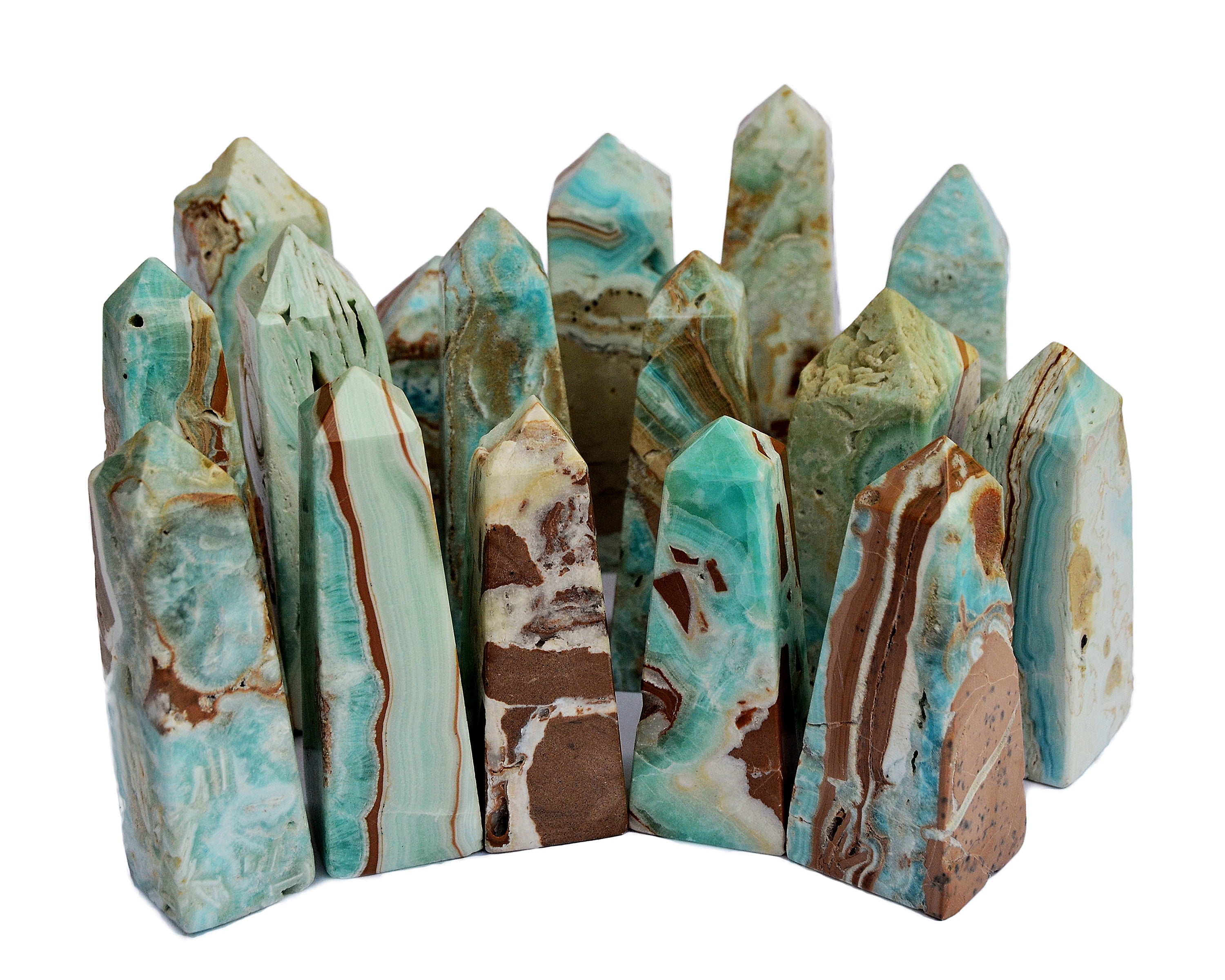 Several blue aragonite obelisks towers different sizes on white background