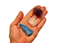 Rough blue kyanite, crystal point and amethyst stones 30mm-60mm on hand with white background