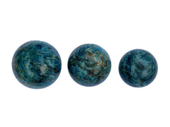 Three blue apatite crystal spheres 45mm-60mm on white background