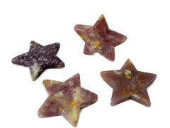 Four lepidolite star crystals 95mm-100mm on white background