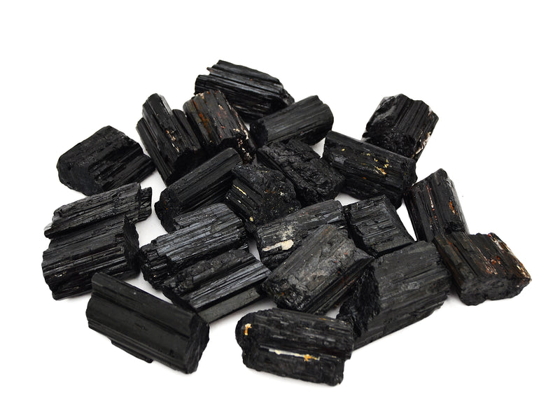 Some rough black tourmaline crystals 35mm-45mm on white background