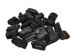 Some rough black tourmaline crystals 35mm-45mm on white background