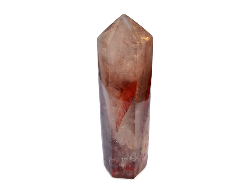 One big fire quartz tower 240mm on hand on white background 