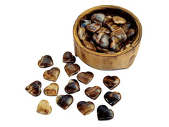 Several chocolate calcite crystal hearts 30mm-35mm inside a wood bowl with background with some hearts on white
