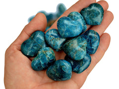 Ten blue apatite crystal hearts 30mm on hand 