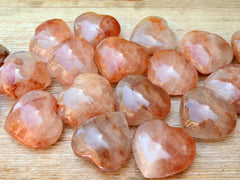 Several fire quartz crystals 45mm-55mm on wood table