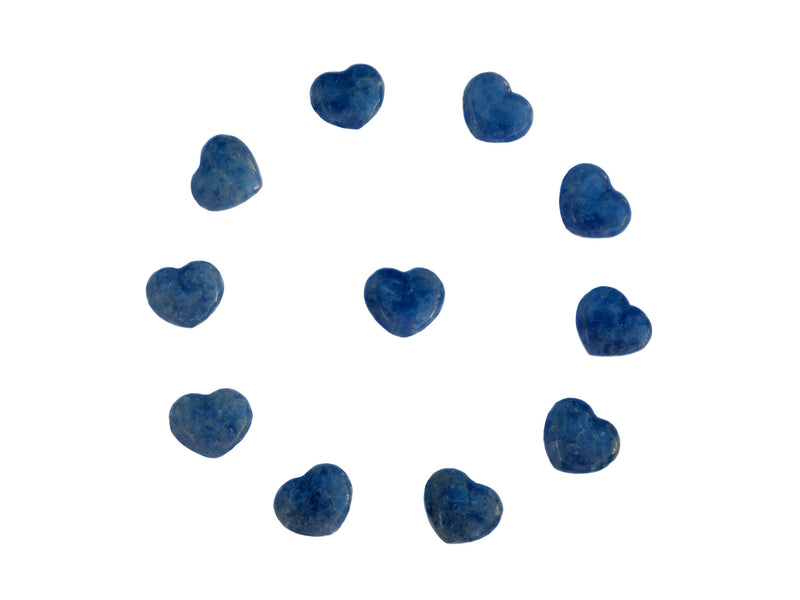 Some mini blue calcite heart minerals 30mm forming a circle on white background