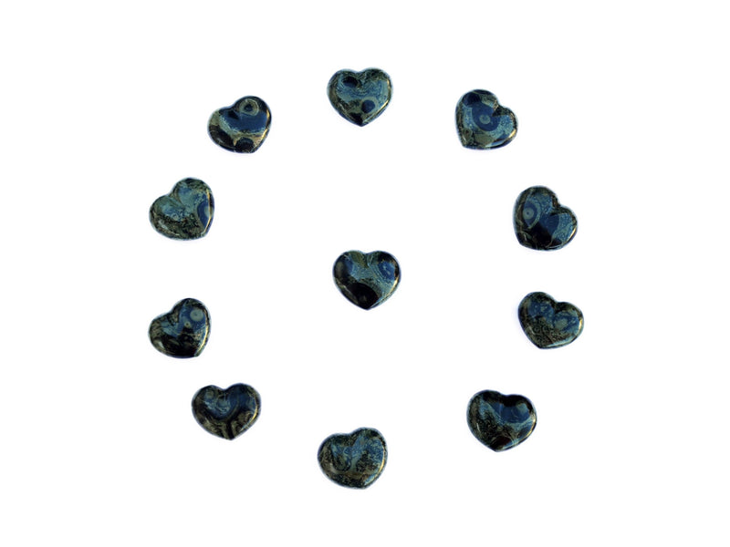 Some kambaba jasper crystal hearts 30mm forming a circle on white background