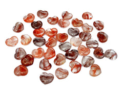 Several fire quartz puffy heart stones 30mm on white background