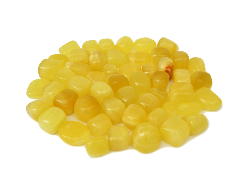 Several yellow calcite mini tumbled minerals 20mm-30mm on white background