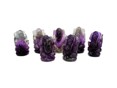 Seven mini amethyst ganesha esculptures 35mm on white background