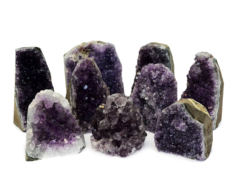 Some druzy amethyst cut base stones 60mm-110mm on white background