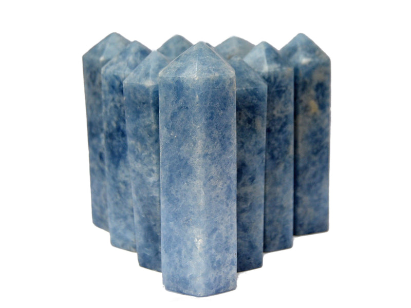 Some blue calcite crystal towers 110mm on white background