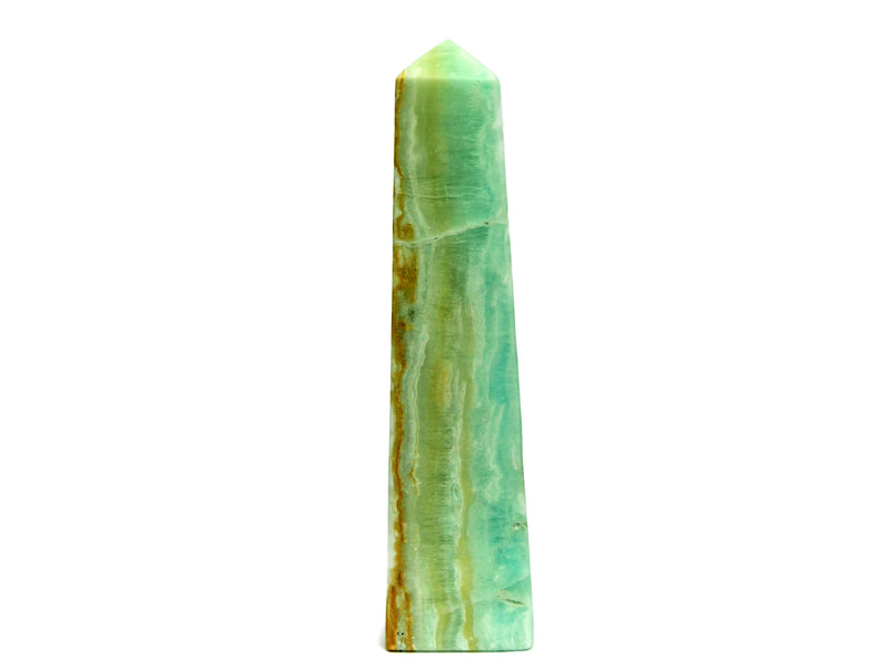 An extra large caribbean calcite obelisk 270mm on white background