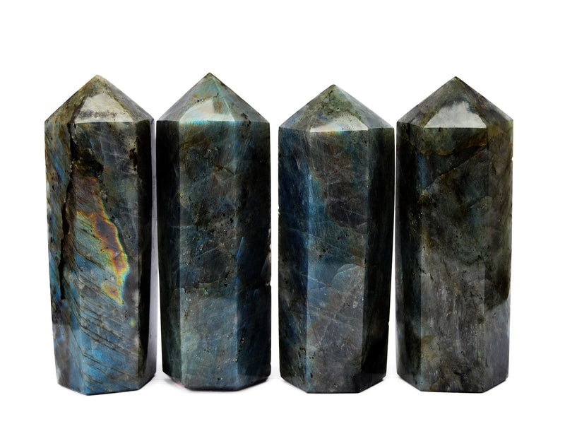 Four large labradorite crystal towers 110mm on white background