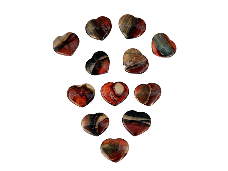 Several polychrome jasper crystal shapped hearts 30mm on white background