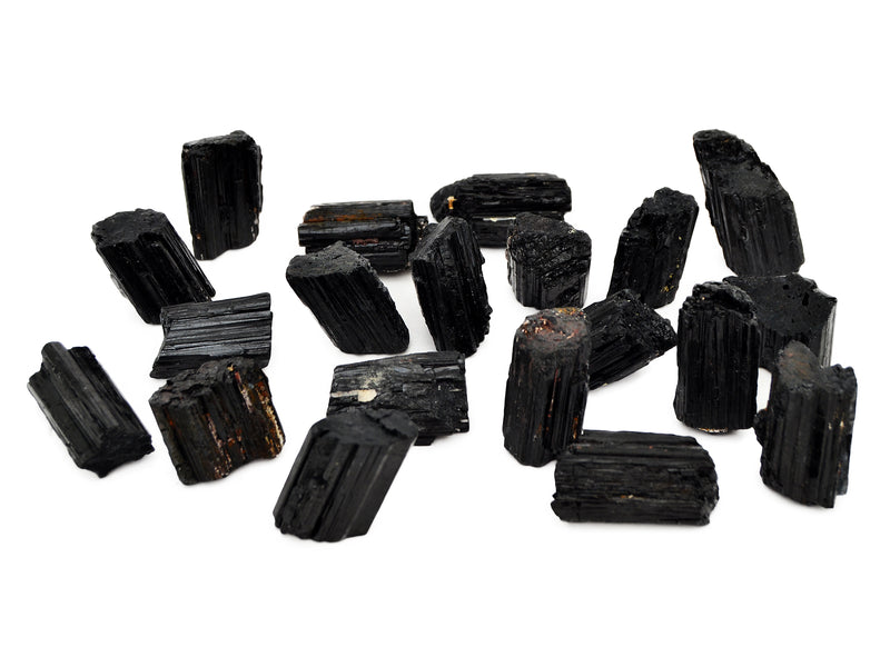 Several raw black tourmaline crystals 35mm-45mm on white background