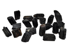 Several raw black tourmaline crystals 35mm-45mm on white background