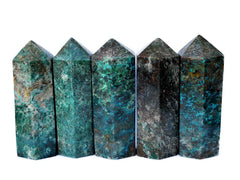 Five large green chrysocolla tower crystals 110mm on white background
