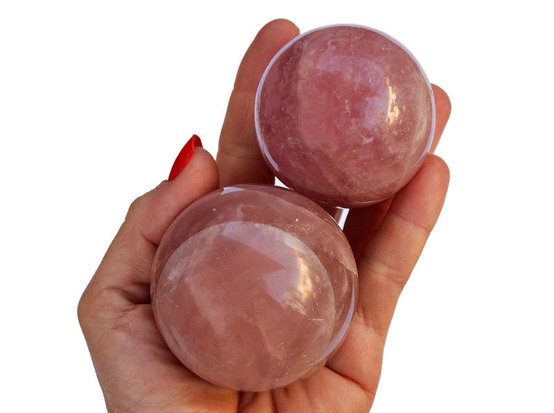 Two large rose quartz sphere crystals 55mm - 60mm on hand