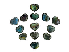 Several flash labradorite puffy heart stones 30mm on white background