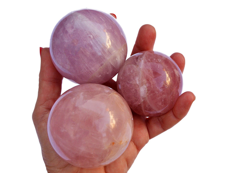 Three large rose quartz sphere stones 55mm - 60mm on hand