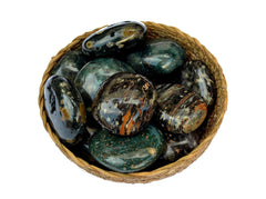 Several ocean jasper palm stones 40mm-65mm inside a basket