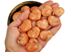 Some orange calcite heart crystals 30mm on hand