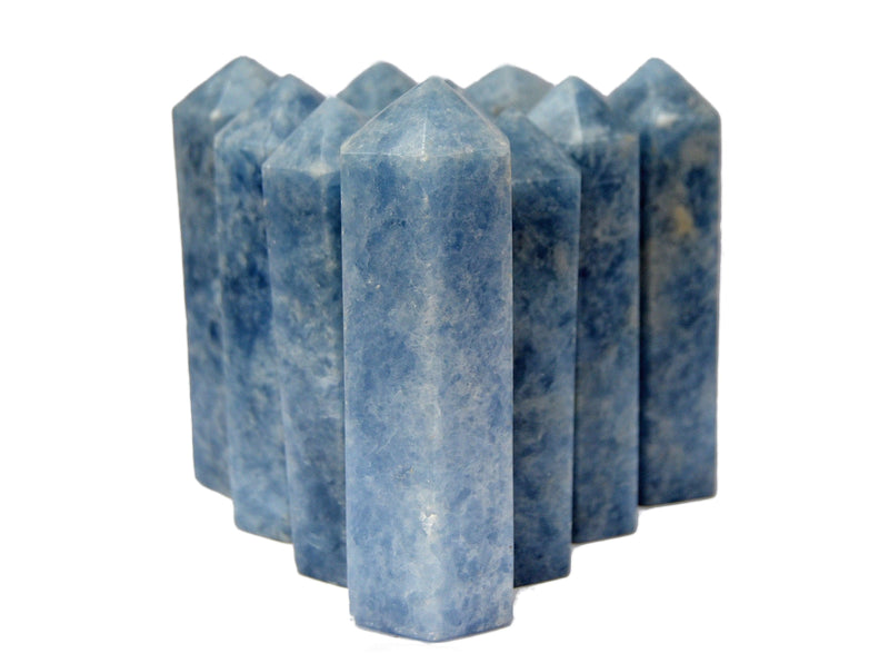 Some large blue calcite crystal tower points 110mm on white background