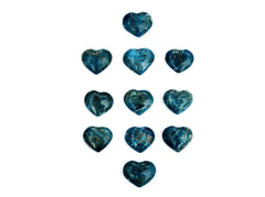Some blue apatite crystal hearts 30mm on white background