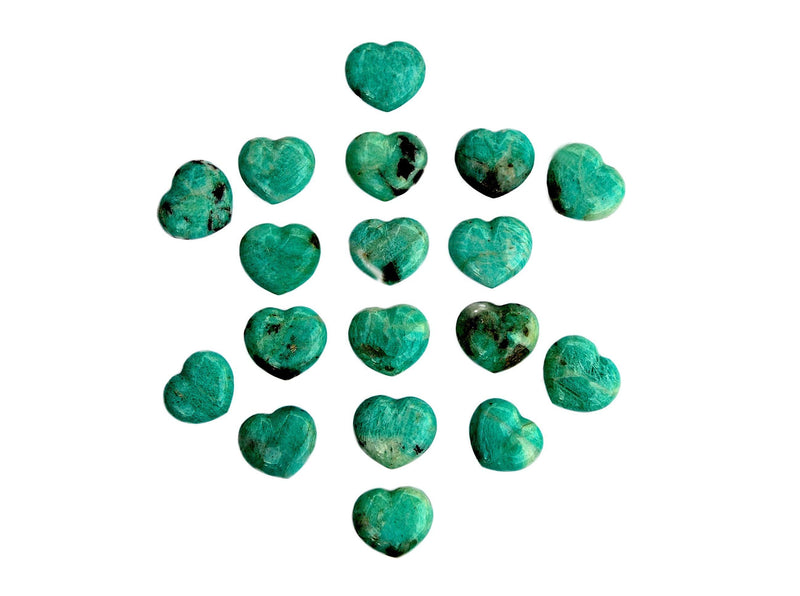 Several small amazonite crystal hearts 30mm on white background