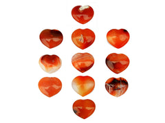 Several natural carnelian stone hearts 30mm on white background