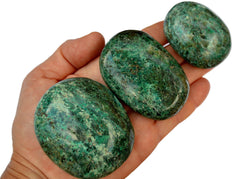 Three green chrysocolla palm stone crystals 75mm-40mm on hand