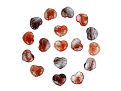 Fire quartz puffy heart crystals 30mm forming a circle on white background