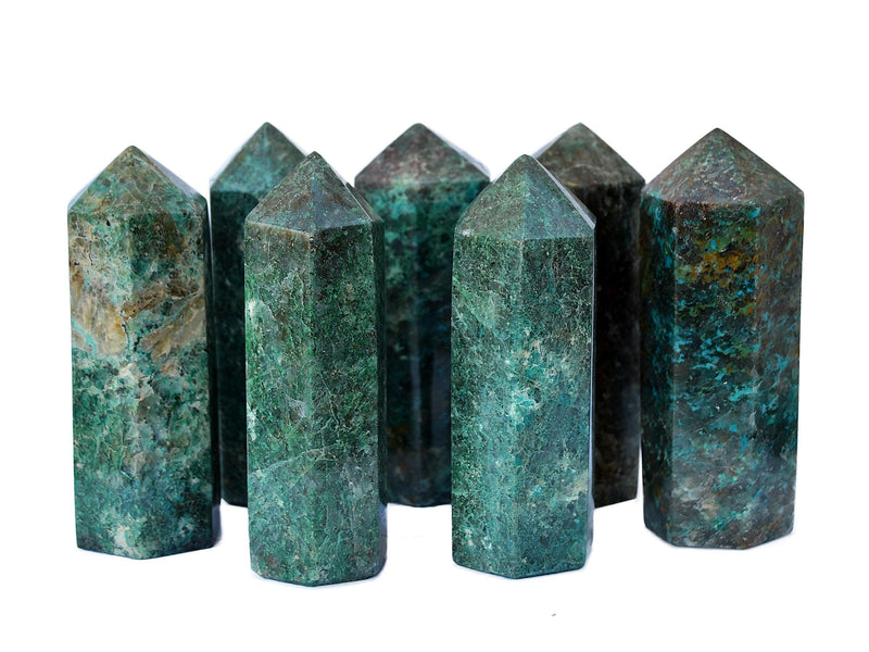 Several large green chrysocolla tower stones 110mm on white background