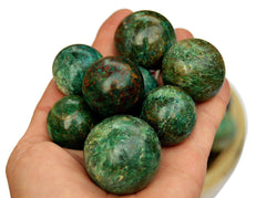 Several green chrysocolla sphere stones 25mm - 40mm on hand