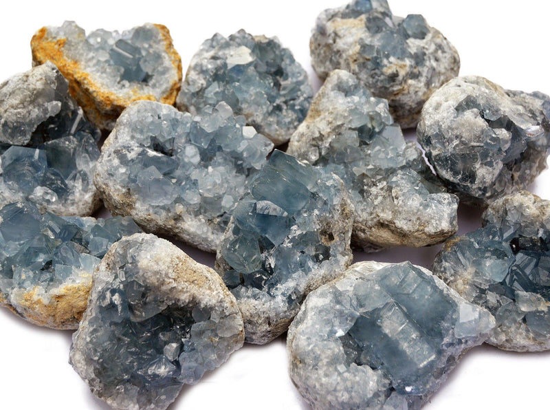 Several blue celcestite geode crystals 60mm - 70mm on white background