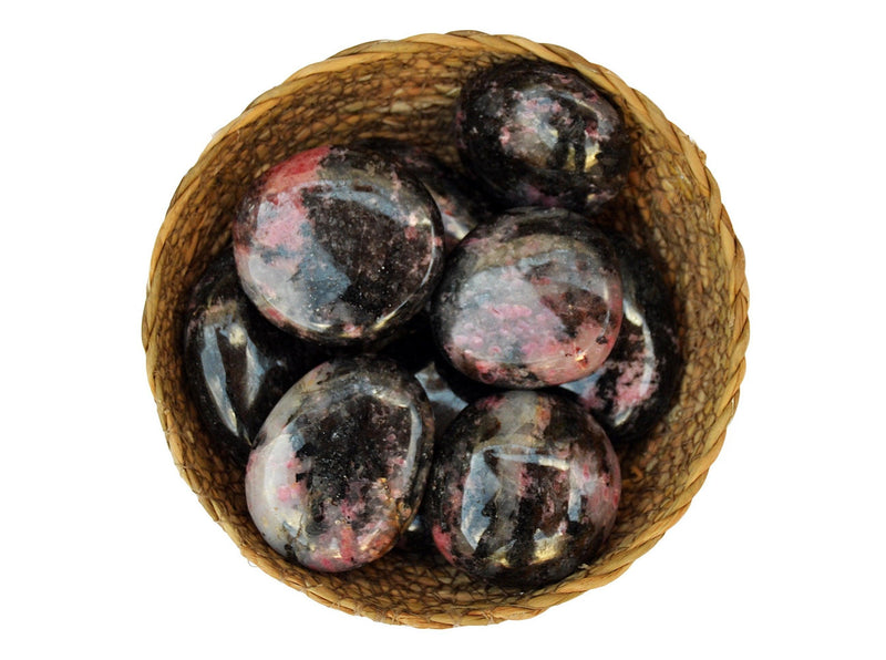 Some rhodonite palm stone crystals 40mm-70mm inside a basket