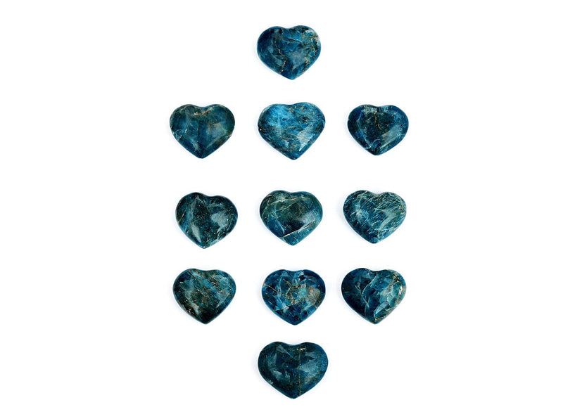 Some small blue apatite heart stones on white background