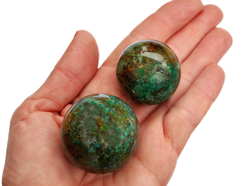 Two green chrysocolla sphere stones 25mm - 40mm on hand