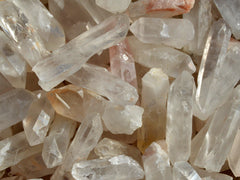 Several small raw crystal quartz points 