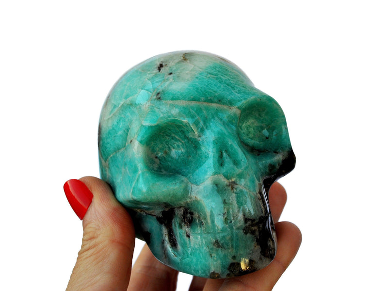 Green amazonite stone skull carving 70mm on hand